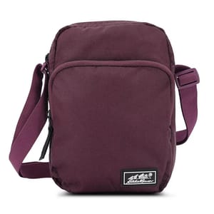 Eddie Bauer Crossbody in purple has a compact design with a front zipper pocket, an adjustable shoulder strap, and a logo patch at the bottom.