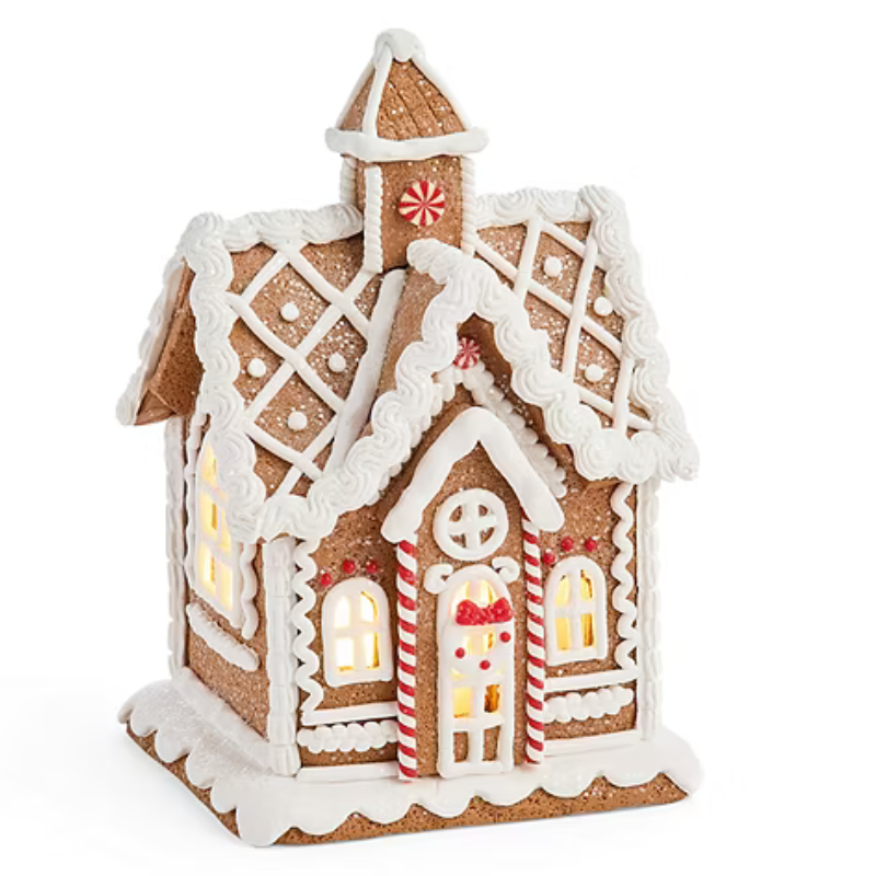 A decorative gingerbread house with icing details, candy-cane striped accents, and illuminated windows, designed to resemble a festive holiday scene.