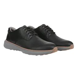 Pair of black lace-up shoes with textured uppers and gray soles, featuring a brown accent strip between the upper and sole.