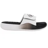 A white slide sandal with an adjustable strap and a gradient black to white sole. The Under Armour logo is visible on the side and the strap.