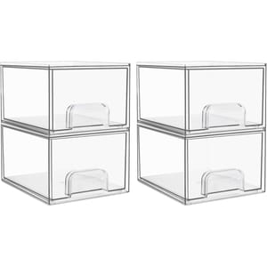 Four transparent stackable storage drawers with handles.