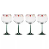 Set of four stemmed glasses with green bases and festive decorative rims featuring holiday-themed patterns.
