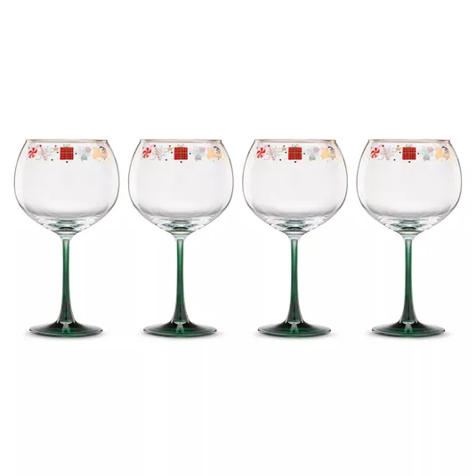Set of four stemmed glasses with green bases and festive decorative rims featuring holiday-themed patterns.