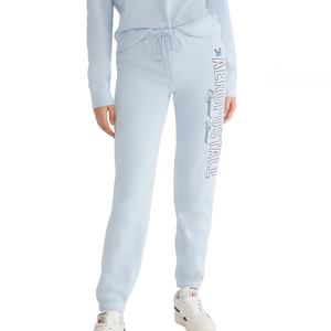 Light blue Aeropostale joggers with elastic cuffs and a drawstring waist, featuring the brand's name and \“Original Brand\“ printed vertically on the left leg.