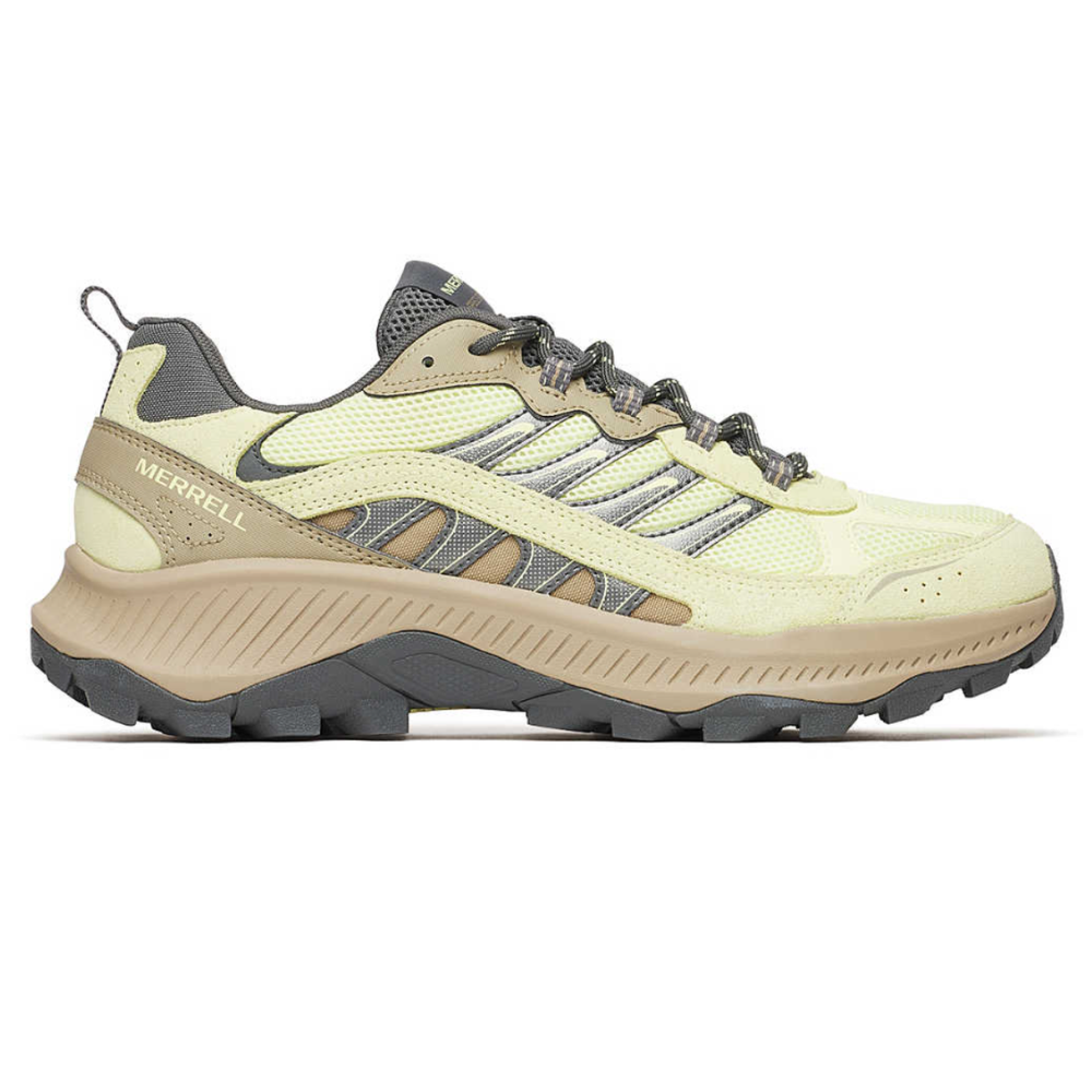 A Merrell hiking shoe featuring a beige and yellow color scheme, rugged outsole, and breathable mesh upper designed for outdoor activities.