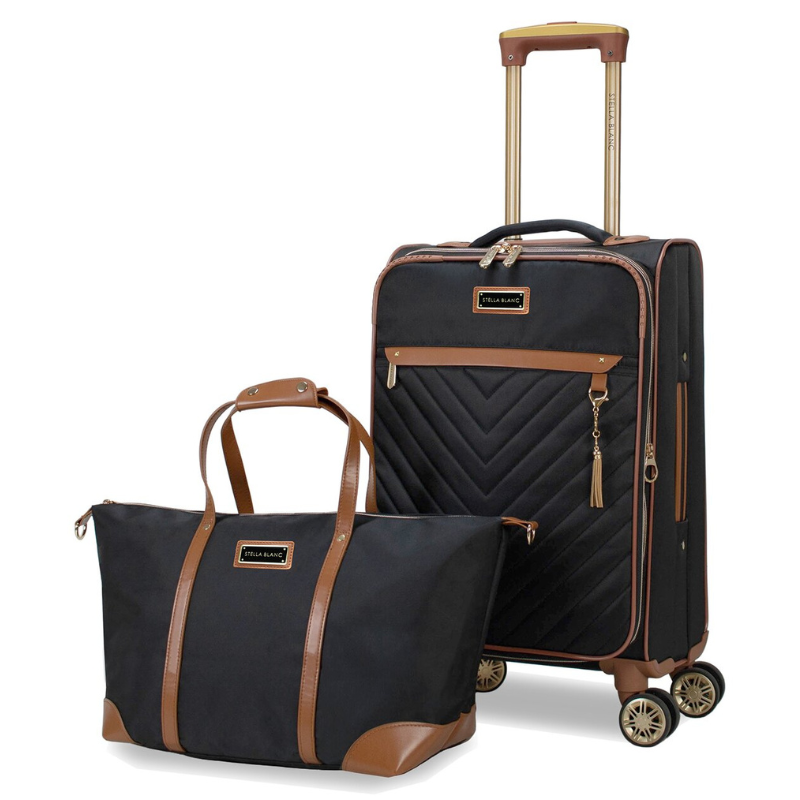 A black rolling suitcase with brown accents and a matching black tote bag are shown, both featuring gold details and the brand \“Stella Blanc\“ on the front.