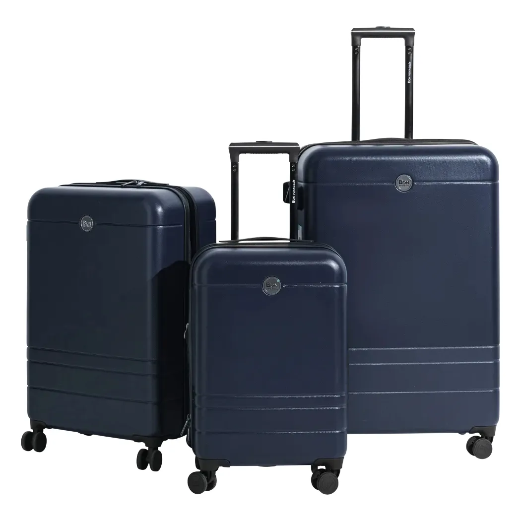 The 3pc Bon Voyage Luggage Set includes three navy blue suitcases of varying sizes with four spinner wheels each and telescopic handles, ideal for easy maneuverability and efficient packing.