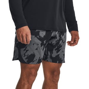 UA Men's Woven Shorts feature a black and gray abstract pattern with a lightweight, flexible design, perfect for athletic activities.