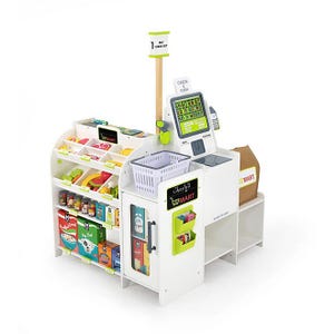 Toy grocery playset with a self-checkout station, featuring a touchscreen, card reader, shopping basket, and shelves stocked with toy food items like fruits, vegetables, cans, and boxes.