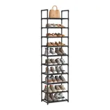 A tall black shoe rack with multiple tiers holds various shoes and a handbag on top, organized neatly for storage and display.