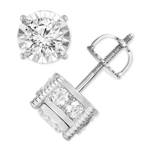 A pair of round diamond stud earrings with a screw-back closure, featuring a central round diamond in a prong setting surrounded by smaller diamonds.