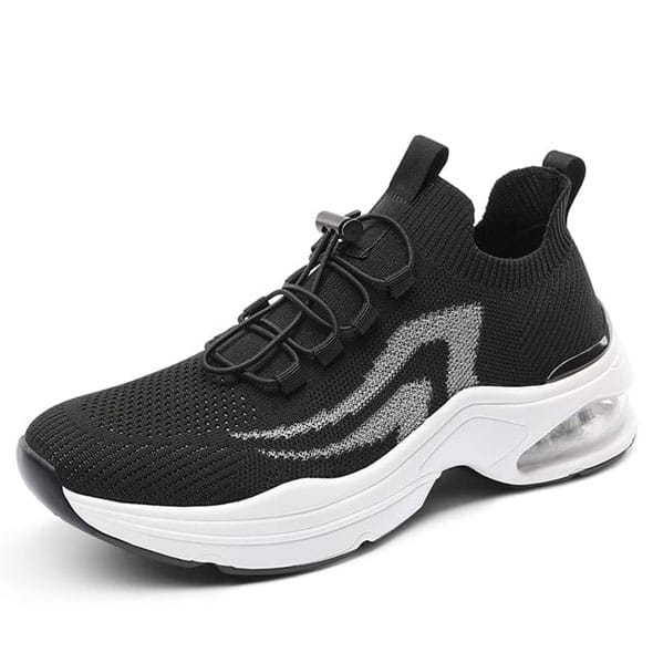 Black knit sneaker with white sole and air cushion in the heel.