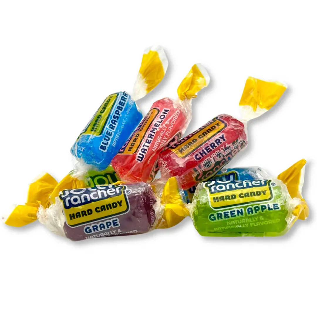 Assorted Jolly Rancher hard candies in flavors: blue raspberry, watermelon, cherry, grape, and green apple. Packaged with yellow-twist wrappers.