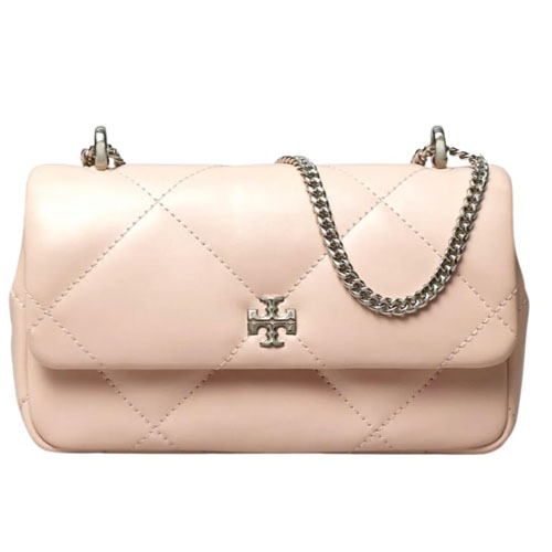 A quilted pink leather handbag with a chain strap and a central emblem resembling a logo.