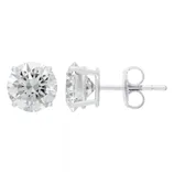 A pair of round-cut diamond stud earrings in a four-prong white metal setting with a push-back closure.