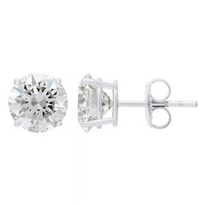A pair of round-cut diamond stud earrings in a four-prong white metal setting with a push-back closure.