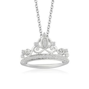 A necklace features a silver crown-shaped pendant inspired by Cinderella, adorned with intricate swirling designs and encrusted with sparkling diamonds. The pendant hangs from a silver chain, offering an elegant and whimsical appearance.