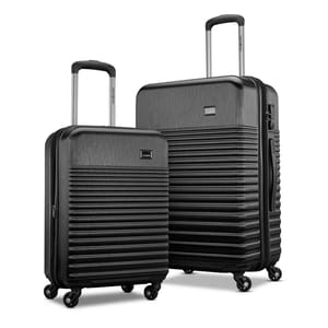 A sleek black Samsonite 2-piece luggage set featuring two hardshell suitcases with telescopic handles and four 360-degree spinner wheels each, designed for easy maneuverability.