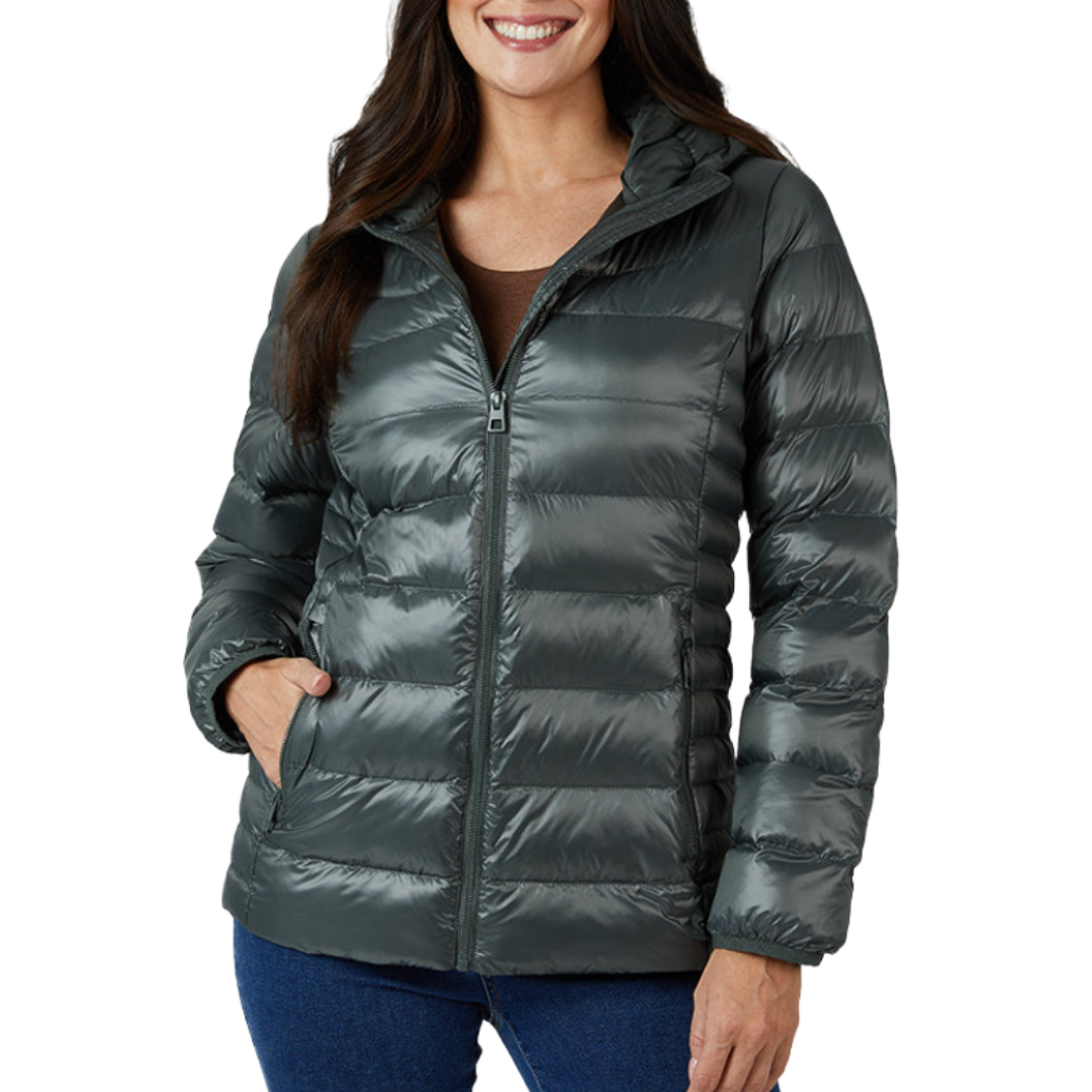 A person wearing a dark gray puffer jacket with a front zipper and side pockets, paired with blue jeans.