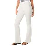 White flare jeans paired with a black-and-white striped top and black sandals featuring gold accents.