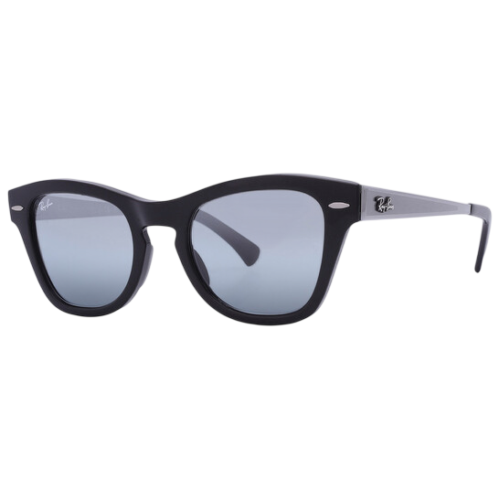 Sleek black sunglasses with blue-tinted lenses feature a wide frame and a silver detailing on the arms, including a small logo.