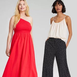 Two women modeling summer clothing, one in a single-shoulder red dress and the other in a cream tank top with black polka dot pants.