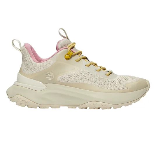 A beige sneaker with a pink interior, featuring a textile and synthetic upper, yellow laces, and a tree logo on the side.