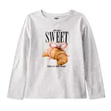 A long-sleeve, gray shirt featuring a croissant with bunny ears and the text \“Always Sweet\“ and \“Enjoy the little things!\“