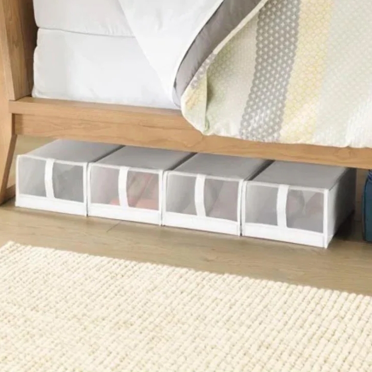 Under-bed storage boxes with a see-through panel.