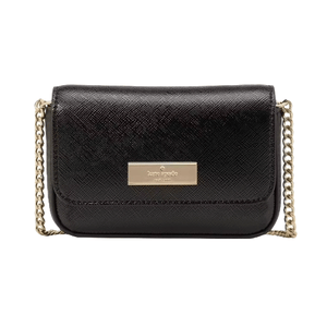 A small black crossbody bag with a gold chain strap and a rectangular gold logo plaque on the front flap.