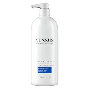 A bottle of Nexxus Humectress Ultimate Moisture Conditioner with ProteinFusion, containing 33.8 fl oz (1 liter).