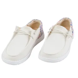 White casual shoes with colorful, multicolored detailing on the heel area, featuring a slip-on design and white soles.