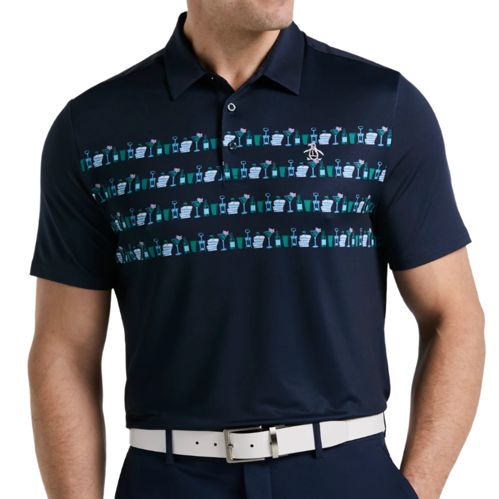 A navy polo shirt features a pattern of colorful cocktail illustrations across the chest, complemented by a white belt.