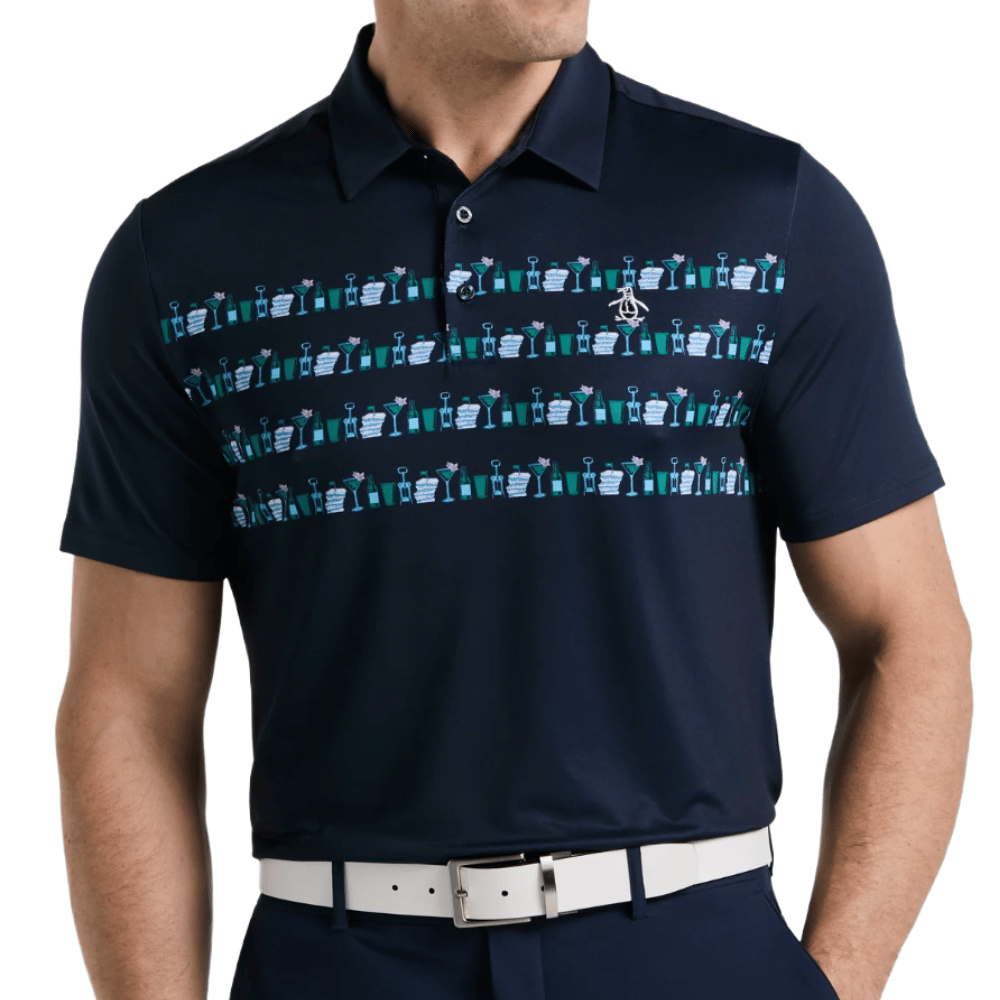 A navy polo shirt features a pattern of colorful cocktail illustrations across the chest, complemented by a white belt.