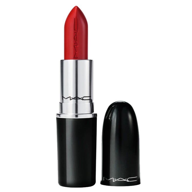 A MAC lipstick with a vibrant red shade, housed in a black and silver bullet-shaped container, with the cap placed beside it.