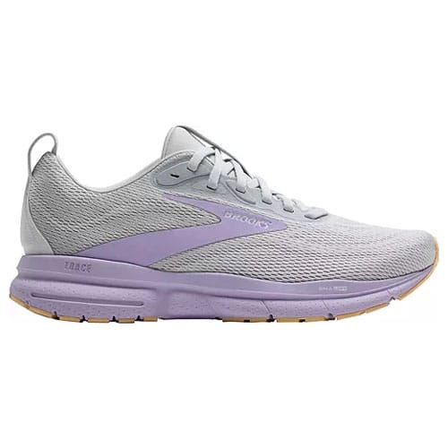 A gray running shoe with purple accents, featuring a breathable mesh upper, supportive cushioning, and a durable outsole.