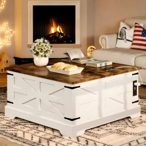 A white farmhouse-style lift-top coffee table with a wooden top, featuring decorative accents and built-in outlets. It holds a vase of flowers, a book, and a tray with bread, set in a cozy room with a fireplace.