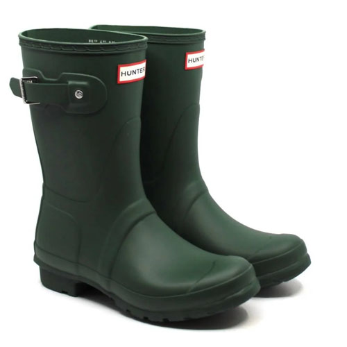 Green rubber boots with red and white Hunter logo on the front top edge, featuring an adjustable buckle on the side.