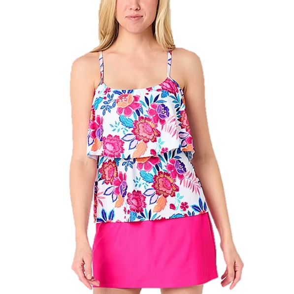 A floral tiered tankini top with spaghetti straps is paired with a bright pink swim skirt.