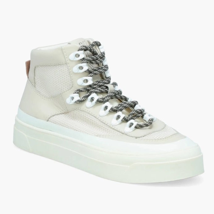 These are high-top, cream-colored sneakers with chunky soles and unique metallic loop eyelets for the laces, which are thick and two-toned.