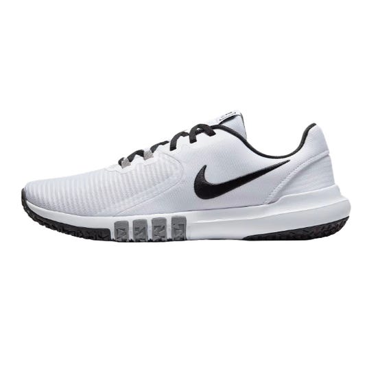 Nike training shoe, white with black swoosh, featuring a low-top design, lace-up closure, and textured sole for grip.