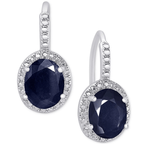 Silver earrings with oval-shaped dark blue gemstones, framed by small clear gems, featuring a hook-style design.