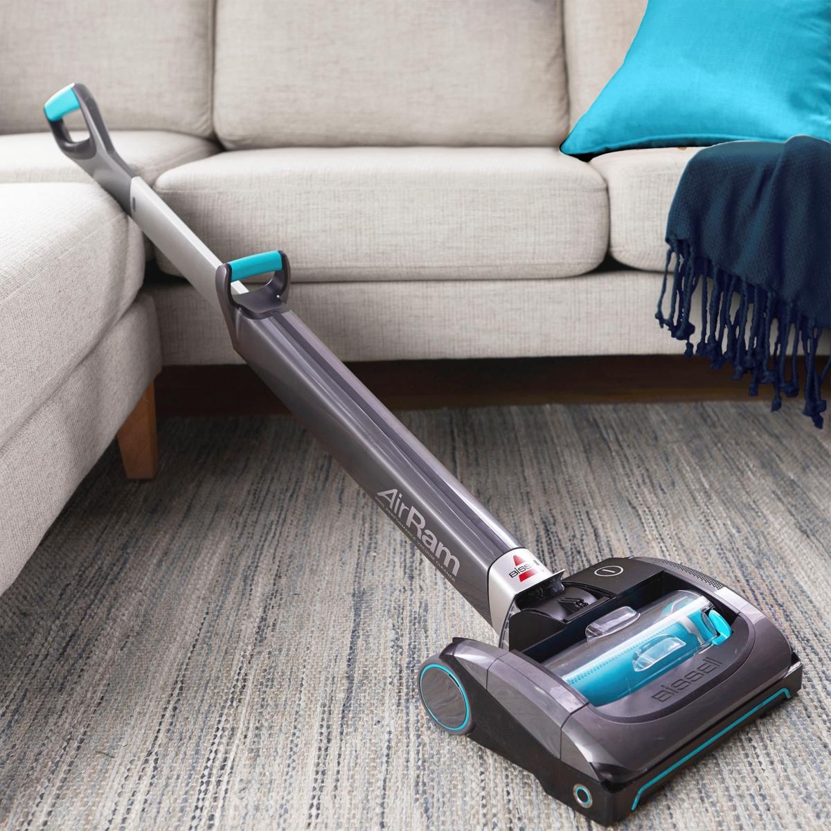 Bissell AirRam Cordless Vacuum is a lightweight, cordless vacuum with a low-profile design for cleaning under furniture. It features a motorized brush roll, large dirt bin, and swivel steering for easy maneuverability on various floor types.