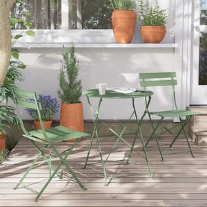 A green 3-piece outdoor bistro set featuring two foldable chairs and a round table, placed on a wooden deck with terracotta potted plants nearby, creating a cozy patio setting.