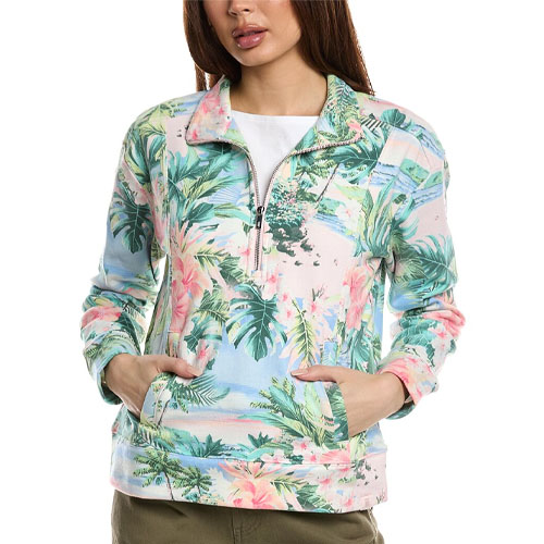 A colorful women's pullover featuring a quarter-zip front and a tropical floral and foliage pattern with shades of green, pink, and blue, complemented by side pockets and a white top layer underneath.