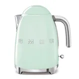 A light green SMEG electric kettle featuring a retro design with a chrome handle and spout, and the brand name prominently displayed on the side.