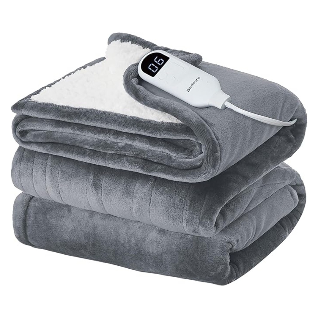 A grey heated blanket with soft, plush fabric and a contrasting white underside. It features a digital controller displaying the number six, indicating adjustable heat settings.