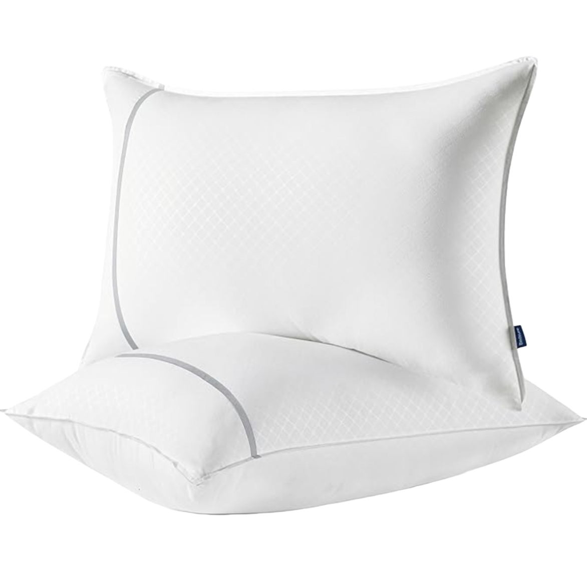 Two plush white pillows with a subtle gray trim and a diamond pattern design.