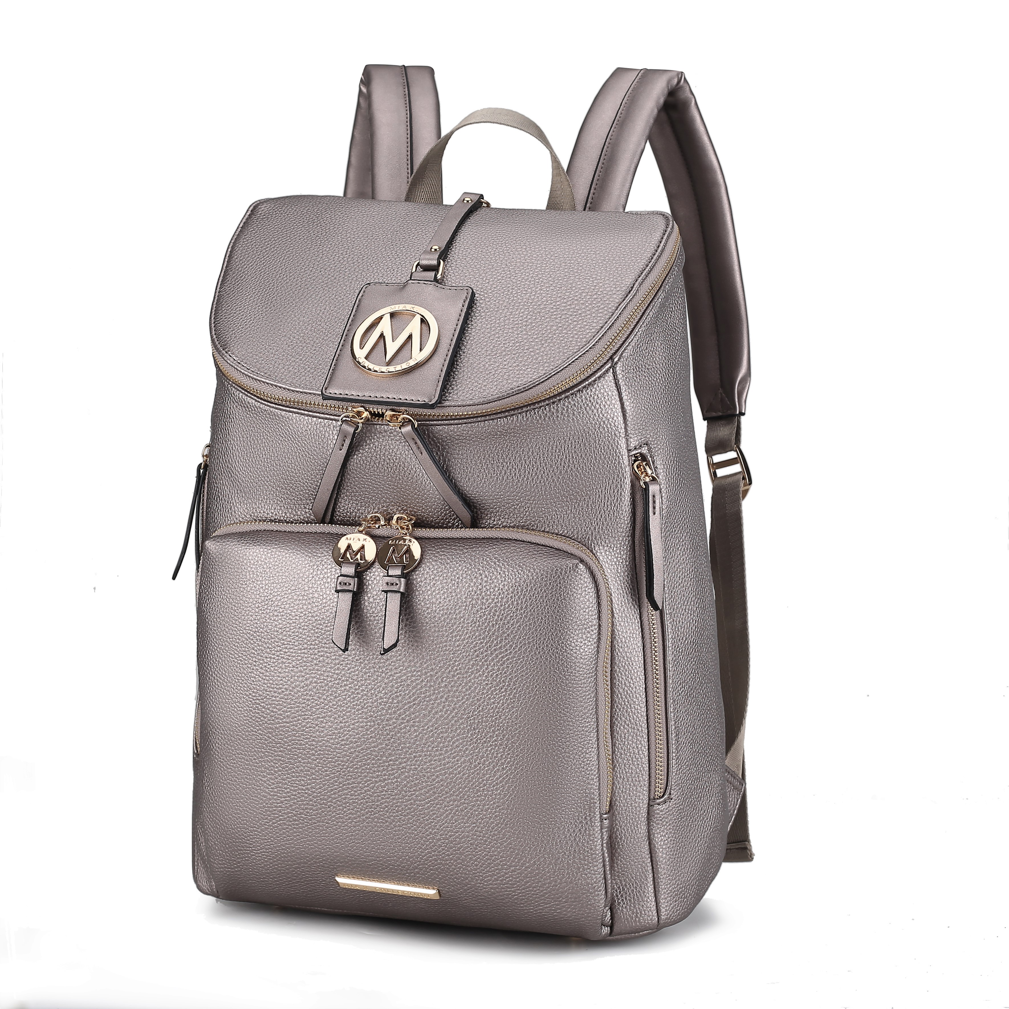 A stylish gray leather backpack with a flap top, gold-tone zippers, and a round emblem featuring the letter \“M\“. It includes a front pocket and padded shoulder straps for comfortable carrying.
