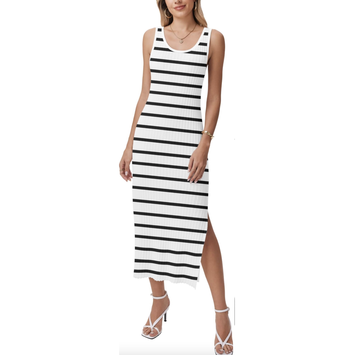 Sleeveless ribbed knit dress with white and black horizontal stripes and a side slit, paired with white strappy high-heeled sandals.